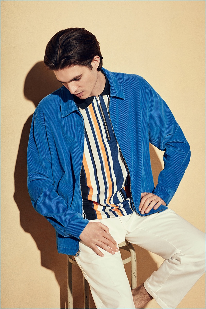 Noon Goons delivers bright colors with its blue club cotton corduroy jacket $270, striped cotton-jersey half-zip polo shirt $140, and club cotton-twill trousers $170.