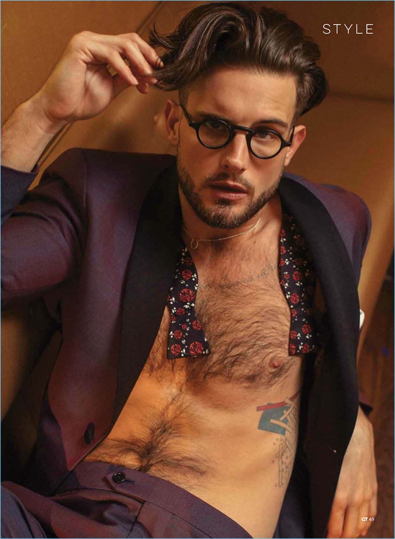 Wearing Thom Browne glasses, Nico Tortorella sports a David Hart tuxedo with a Billy Reid bow-tie, and J.Hilburn pocket square.