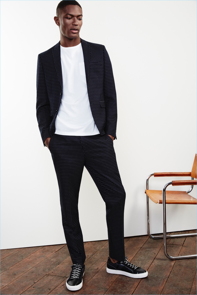 British fashion brand River Island delivers a navy polka dot suit with a sharp skinny fit jacket $220 and pants $80.