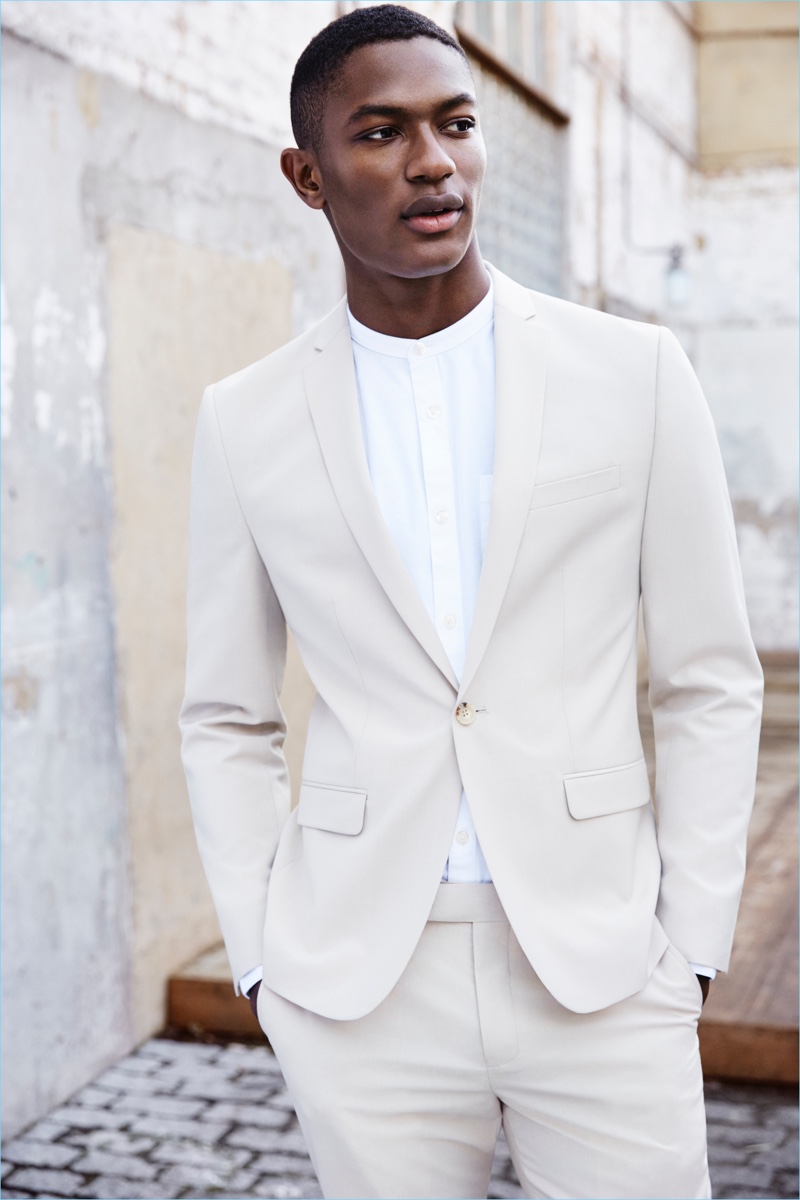 Prepare for summer with a River Island beige linen slim-fit suit jacket $220 and trousers $80.