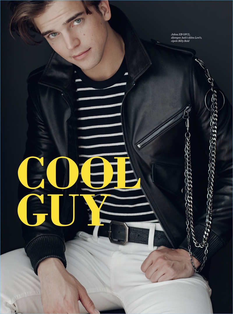 Model River Viiperi dons a leather biker jacket by XBOFCL with a Levi's striped tee and denim jeans.