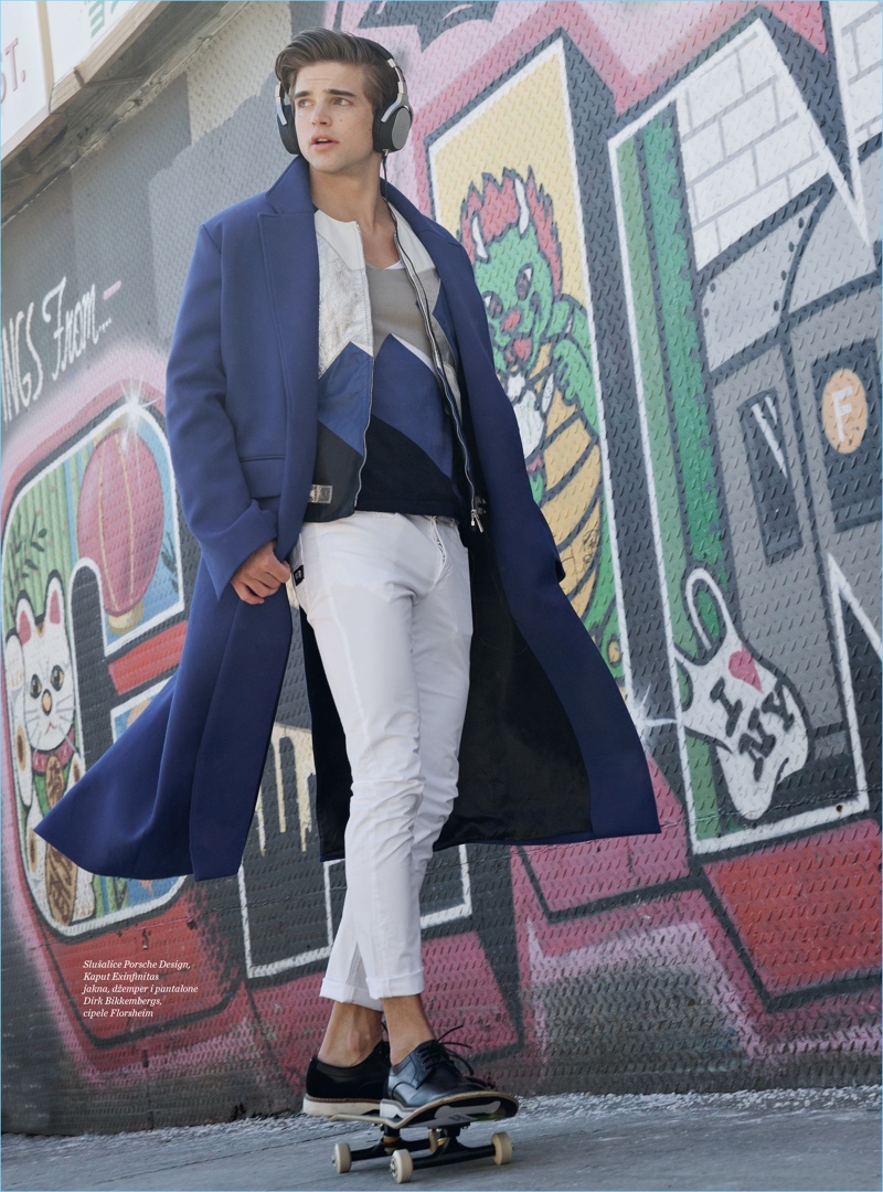 Skateboarding, River Viiperi dons a luxurious Porsche Design coat and Florsheim shoes with Dirk Bikkembergs pieces.