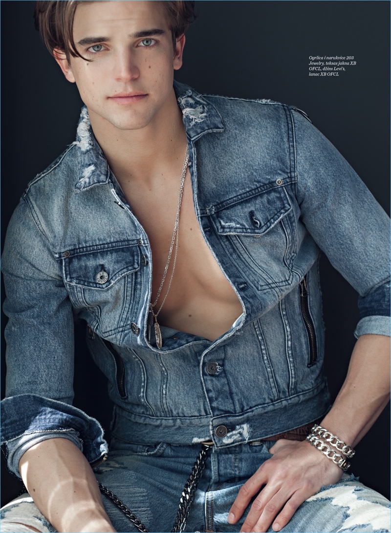 Sporting denim, River Viiperi wears fashions from Levi's and XBOFCL.