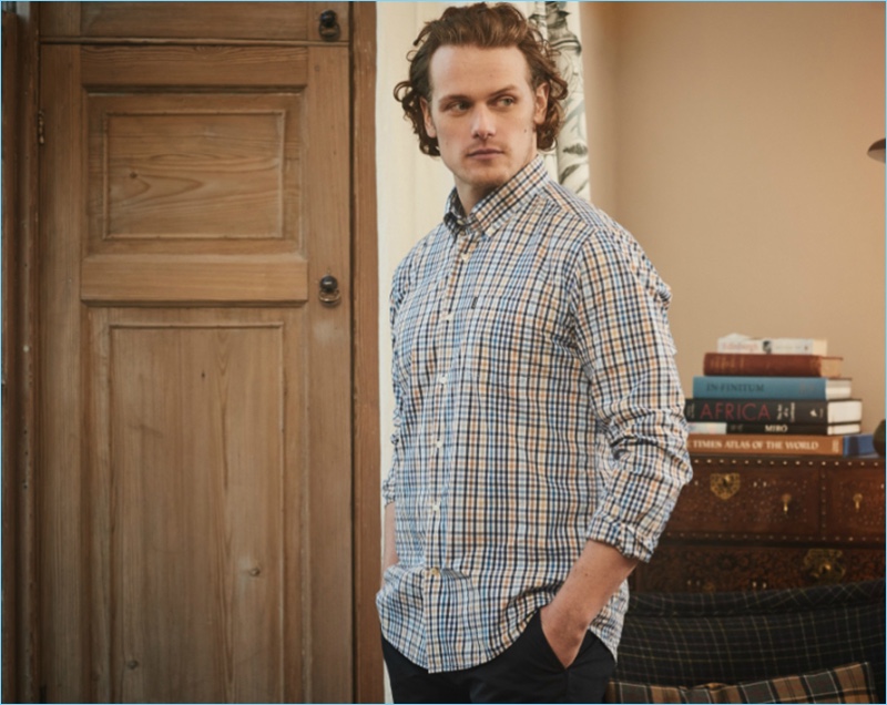 Reuniting with Barbour for its spring-summer 2017 campaign, Sam Heughan wears a plaid shirt $144.