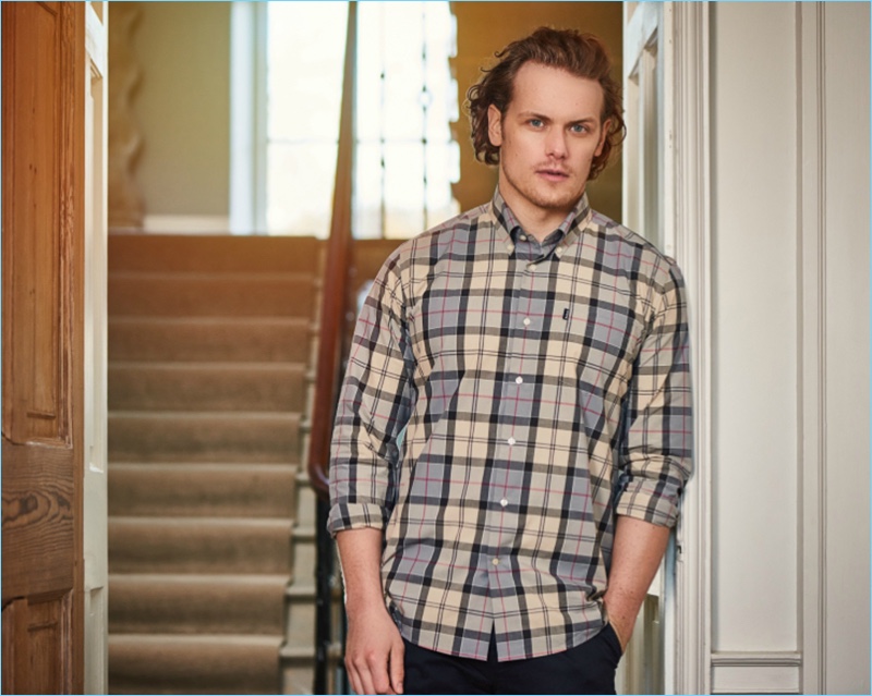 Actor Sam Heughan dons a Barbour tartan shirt $95.13 for the label's spring-summer 2017 campaign.