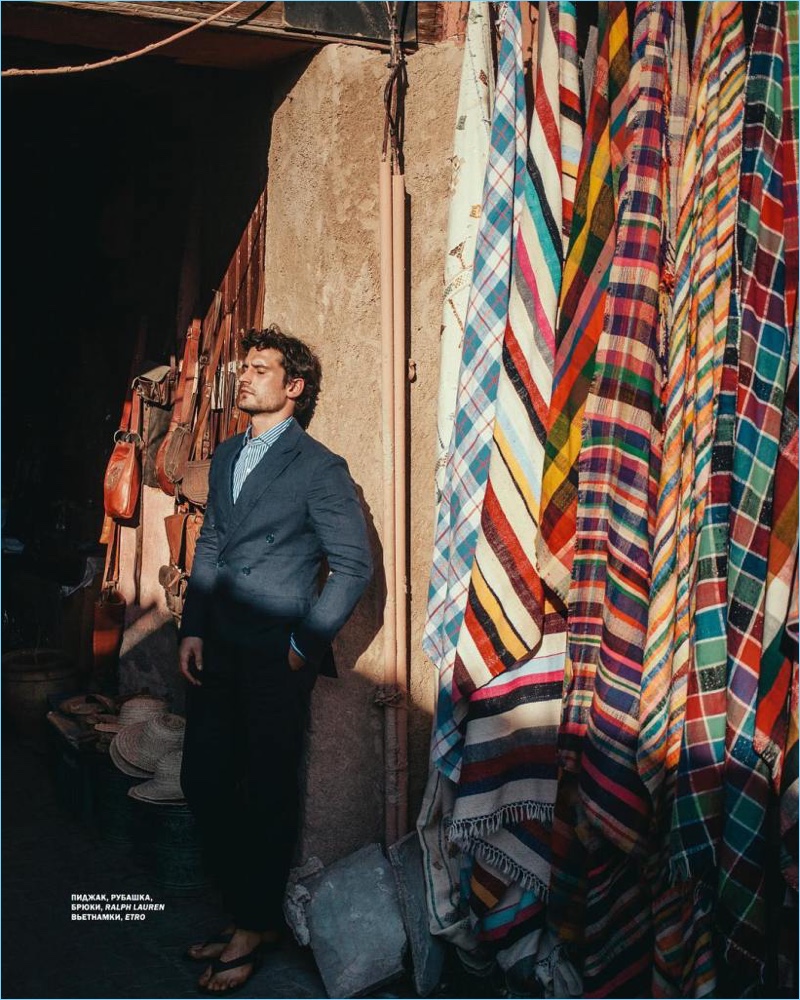 Stealing a quiet moment, Sam Webb dons smart fashions from Ralph Lauren and Etro.