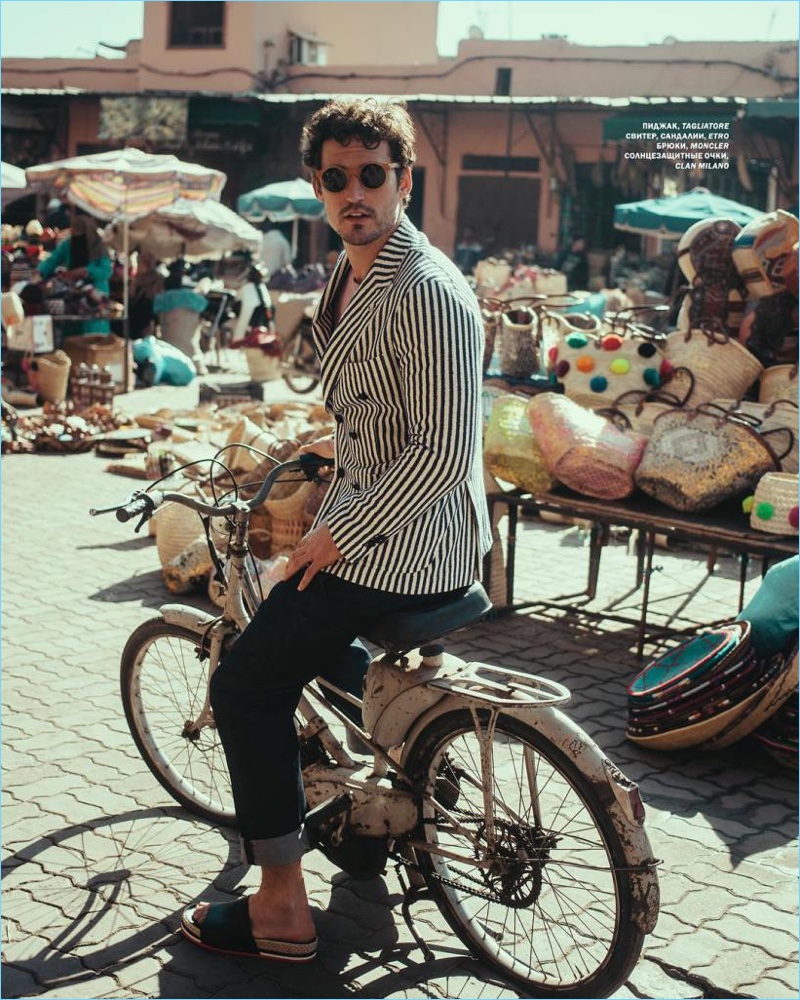 Riding a bike, Sam Webb wears Tagliatore, Etro, and Moncler for the pages of L'Officiel Hommes Ukraine.