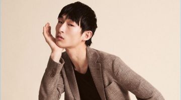 Sang Woo Kim Dons Giorgio Armani for Sleek Magazine Starring in an editorial for Sleek magazine, Sang Woo Kim wears Giorgio Armani.