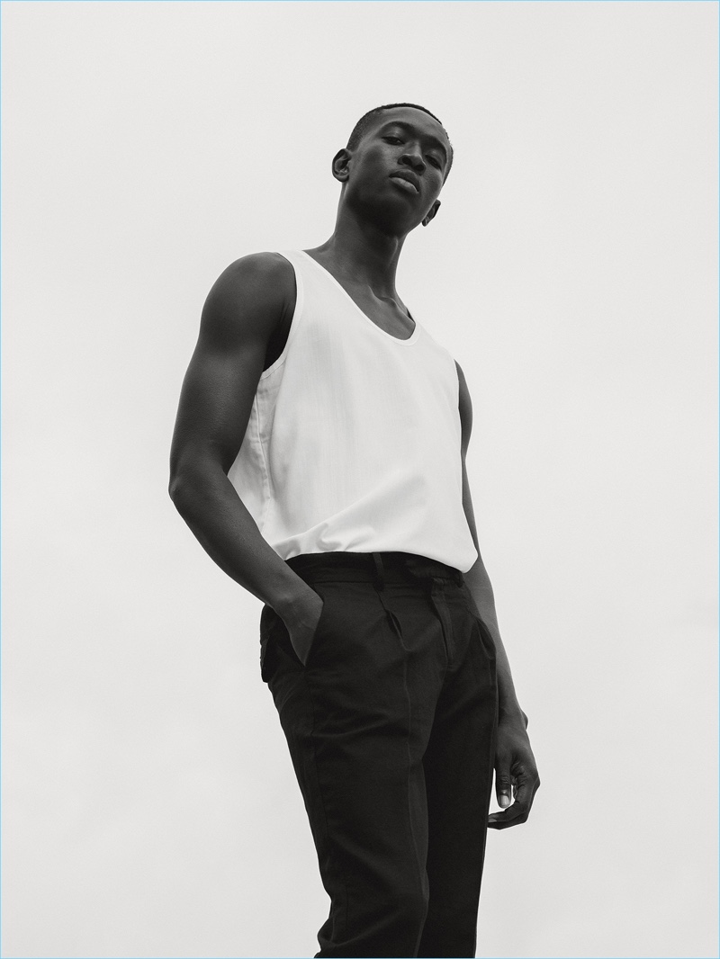 Ben Grieme photographs Fallou Diaw in a black and white look from Saturdays NYC's pre-fall 2017 collection.