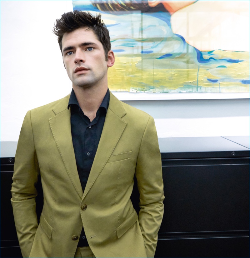 Going for color, Sean O'Pry wears a Tommy Hilfiger shirt with a black Canali shirt.