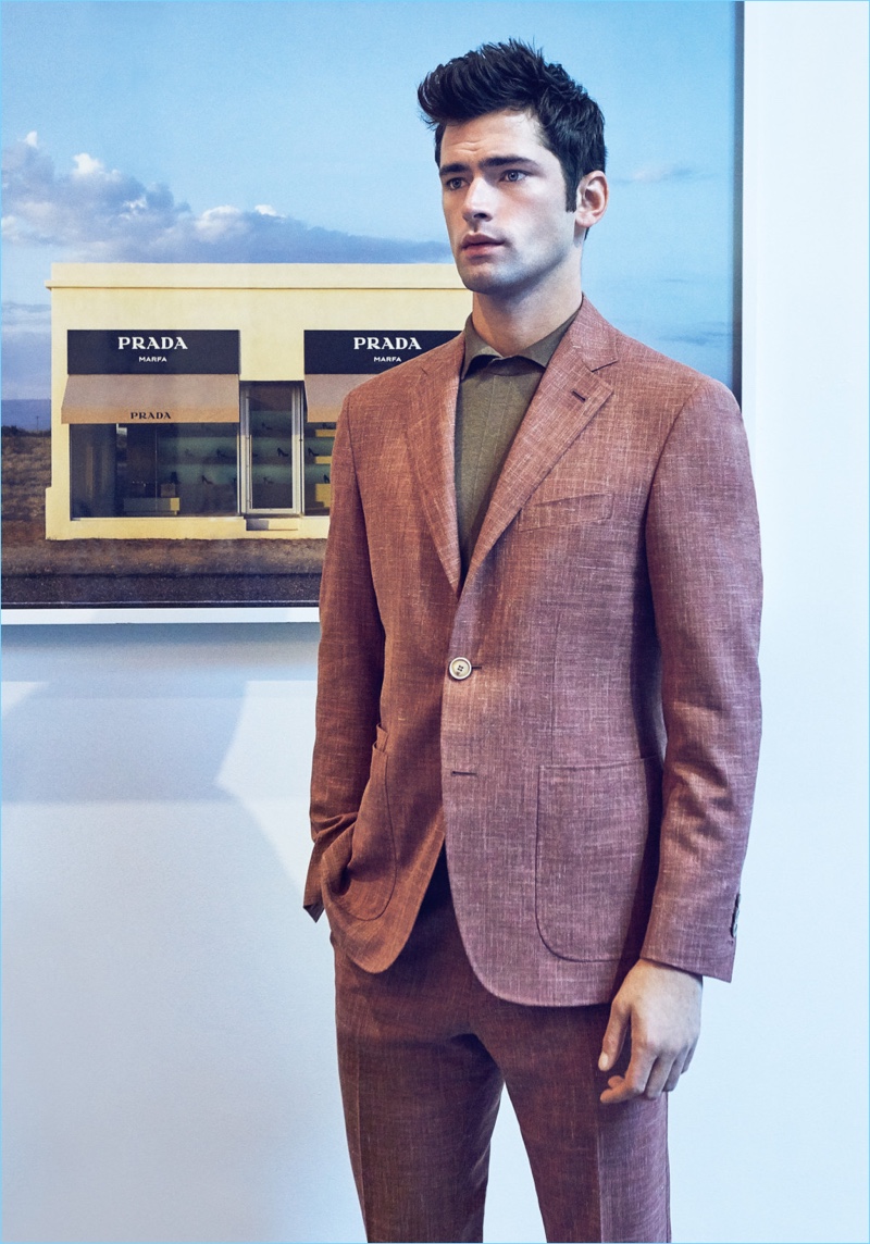 American model Sean O'Pry sports a linen Canali suit with a Versace polo.
