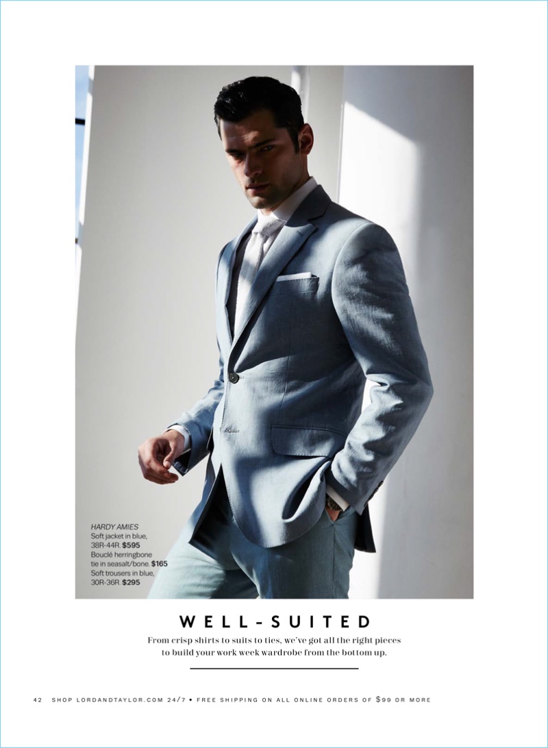 Well-suited, Sean O'Pry dons a blue Hardy Amies soft jacket $595 and trousers $295. Sean also sports a Hardy Amies bouclé herringbone tie $165.