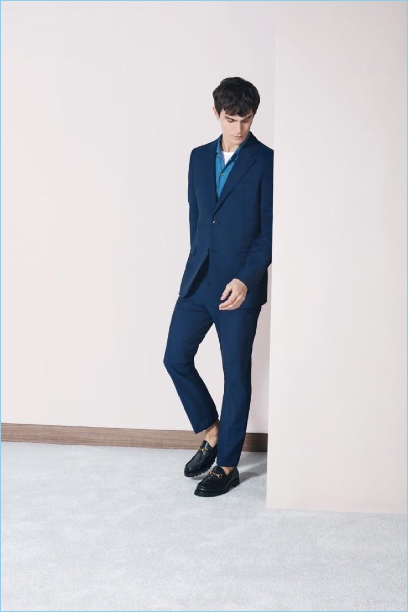 Suiting up, Vincent LaCrocq dons a Stella McCartney blue slim-fit woven jacket $1,375 and trousers $535. The French model also wears a Stella McCartney camp-collar piqué cotton shirt $540.