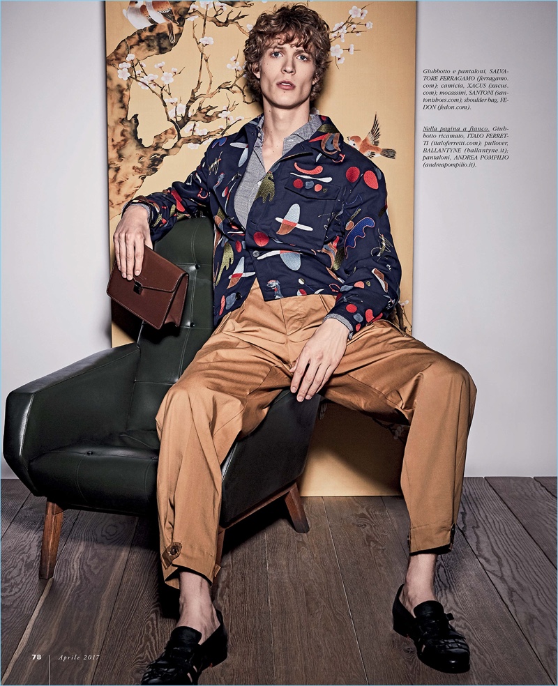 Front and center, Sven de Vries wears a jacket and pants by Salvatore Ferragamo. The Dutch model also sports a Xacus shirt with Santoni moccasins and a Fedon bag.