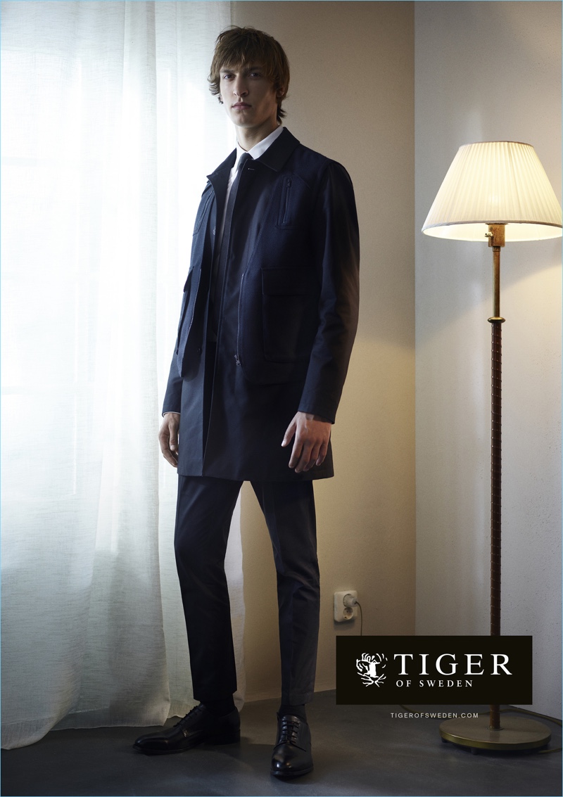 Boe Marion photographs Tim Dibble in a sleek navy ensemble for Tiger of Sweden's spring-summer 2017 campaign.