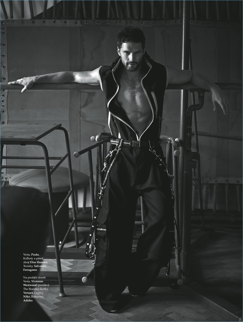 A sporty vision, Tomas Skoloudik wears a Prada vest with Dior Homme trousers, and Salvatore Ferragamo shoes.