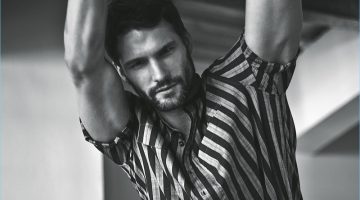 Tomas Skoloudik Embraces Sporty Fashions for Elle Man Czech Tomas Skoloudik sports a striped Dolce & Gabbana shirt with Emporio Armani underwear and Adidas shorts.
