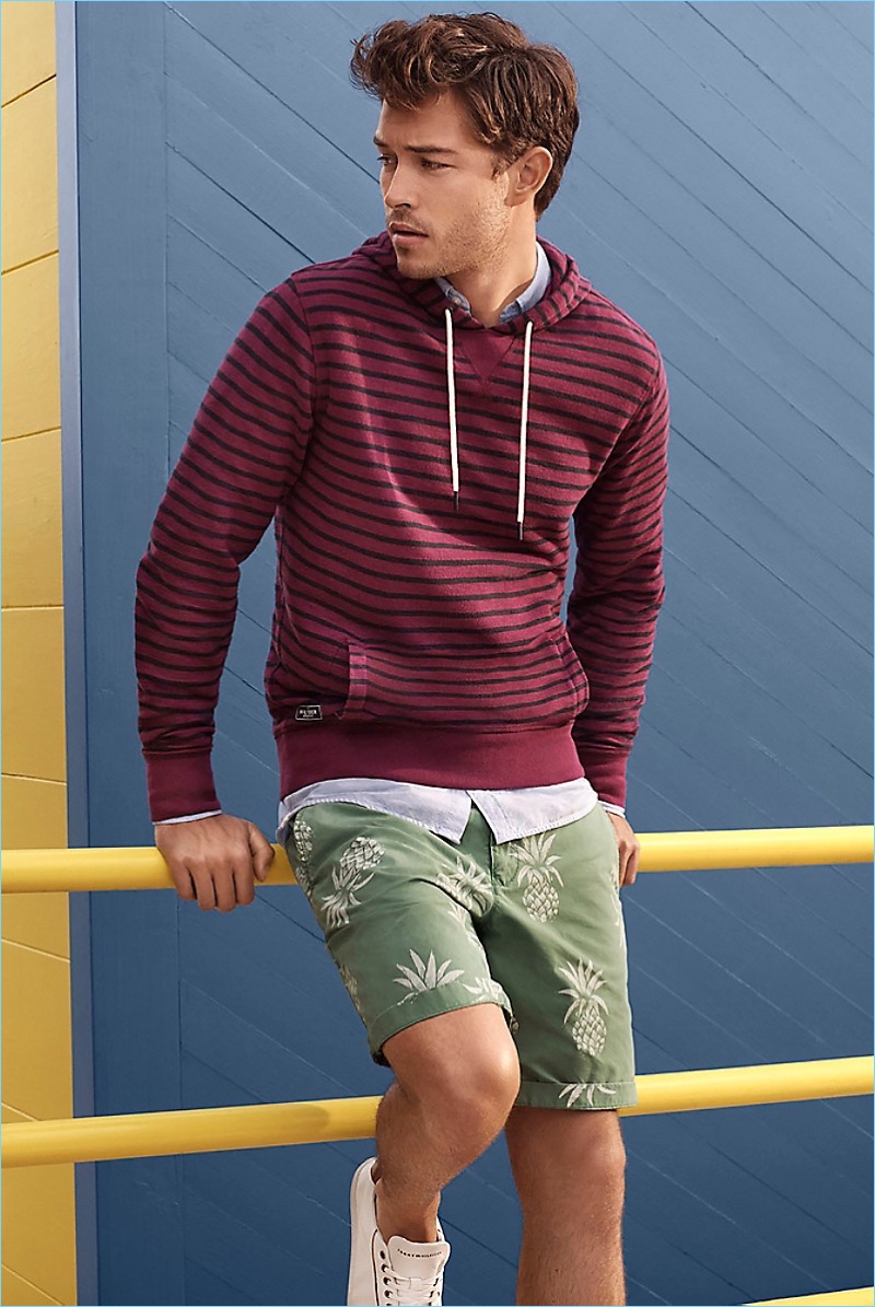 Print It Out: Francisco Lachowski sports a Tommy Hilfiger striped hoodie $119.50 and pineapple print club shorts $89.50.