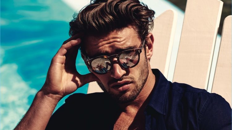 Relaxing poolside, Jack Tyerman models Vilebrequin Bond sunglasses.