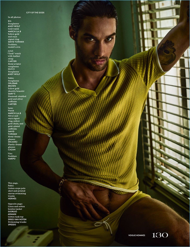 Pablo Morais wears a green knit polo and swimsuit by Hermes.