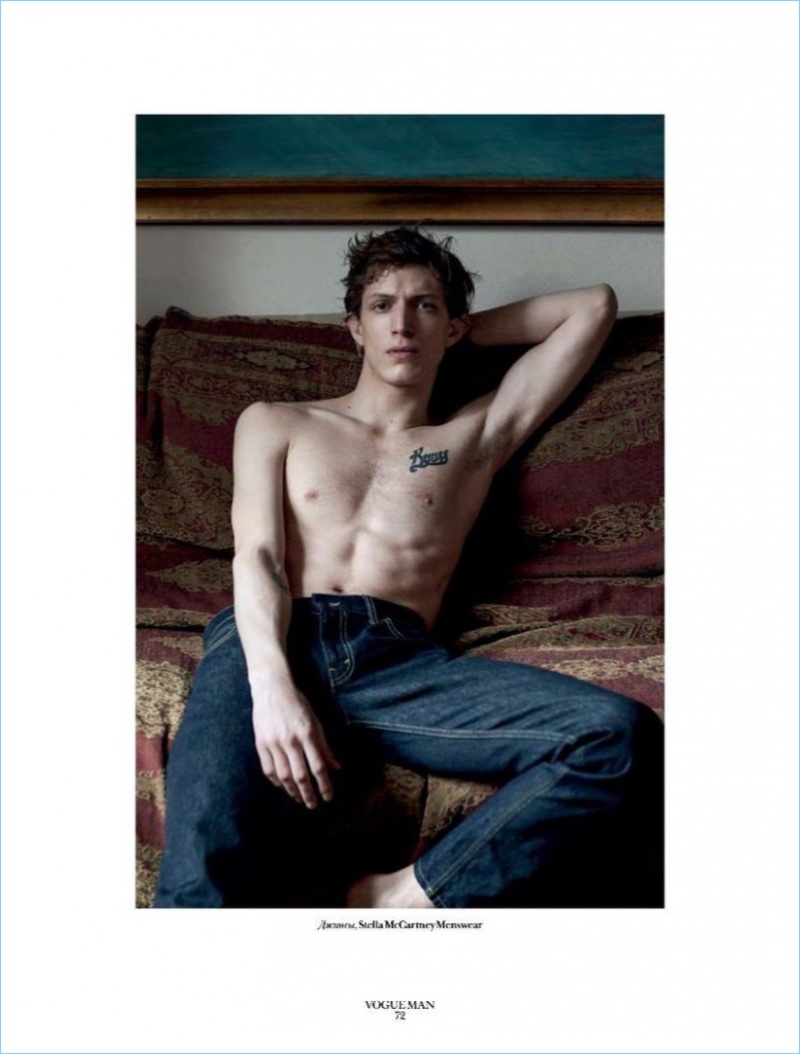 A shirtless Xavier Buestel wears Stella McCartney blue jeans for Vogue Man Ukraine.