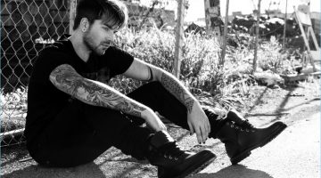 Adam Lambert Connects with Flaunt, Dishes on Heartbreak & Disappointment Adam Lambert wears a Cult of Individuality t-shirt and jeans with COS boots.