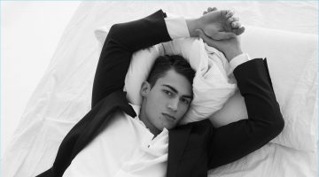 Alessio Pozzi Charms in Icarius Photo Shoot Laying in bed, Alessio Pozzi wears all Prada.