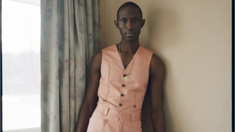 Armando Cabral dons a vest and trousers by Roberto Cavalli.