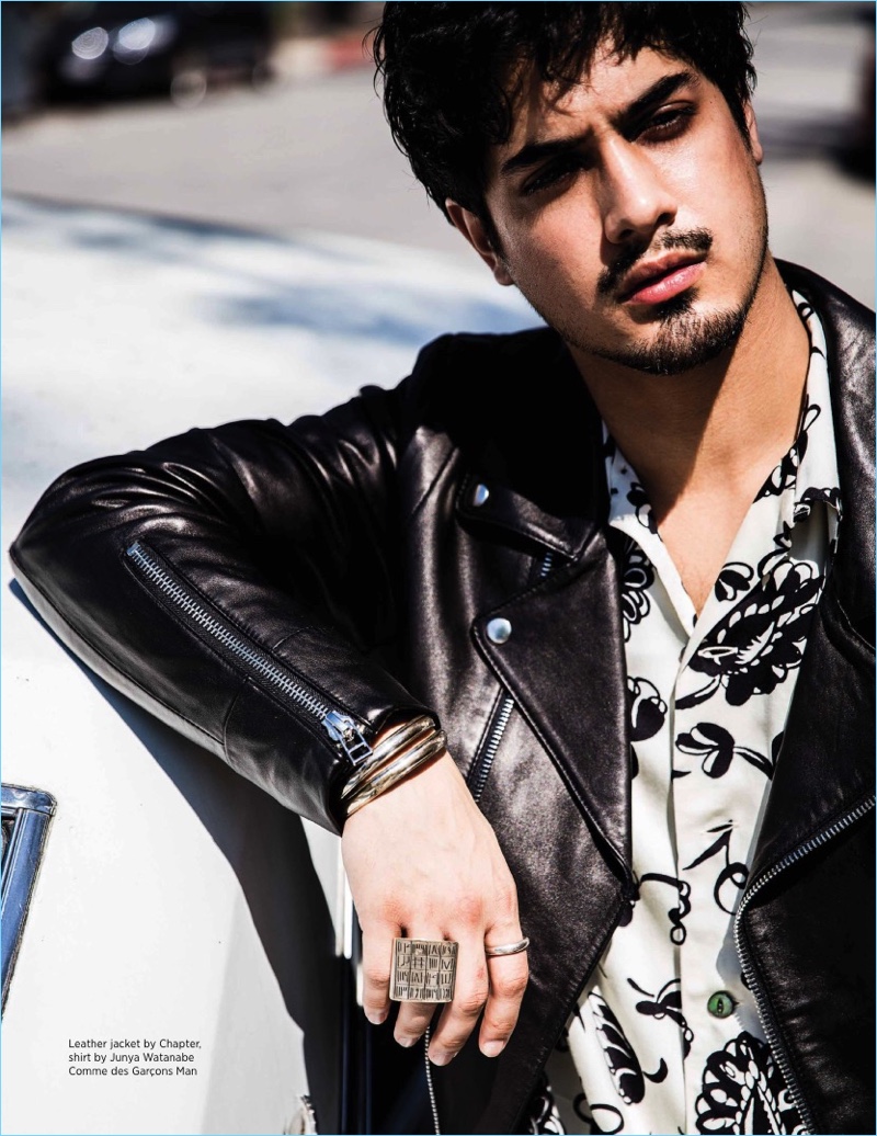 A cool vision in a Chapter leather biker jacket, Avan Jogia wears a Junya Watanabe shirt.