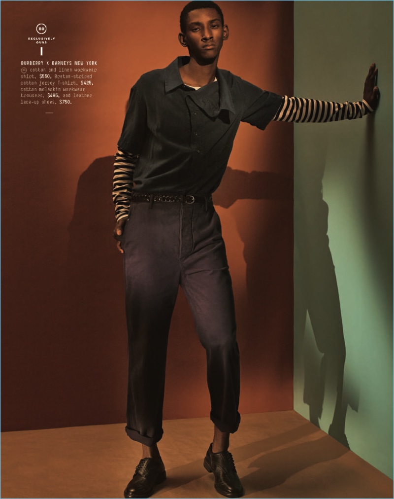 Embracing workwear inspirations, Myles Dominique wears a Burberry chambray smock shirt $550, wide-leg trousers $485, and other stylish pieces from the brands.