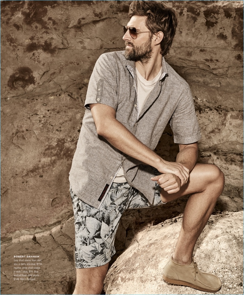 Embracing an earthy hues, RJ Rogenski wears a Robert Graham short-sleeve linen shirt $138 and v-neck t-shirt $78. He also sports Robert Graham floral print shorts $148.