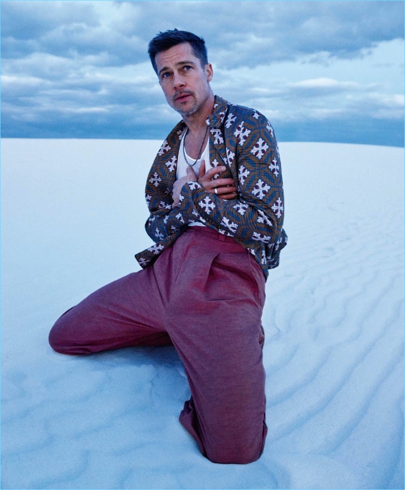 Ryan McGinley photographs Brad Pitt in a Giorgio Armani printed jacket with a Rick Owens tank. Pitt also rocks Bottega Veneta pants, a David Yurman necklace and a Miansai ring.