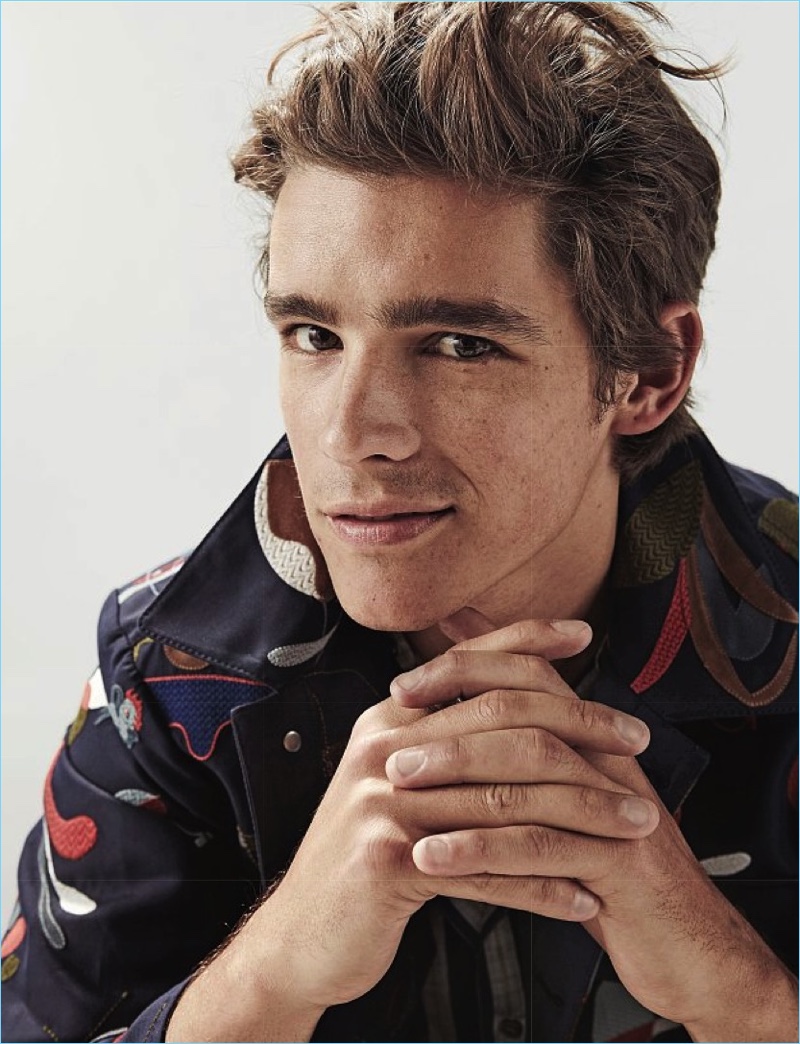 Starring a Style photo shoot, Brenton Thwaites wears a graphic jacket from Salvatore Ferragamo.