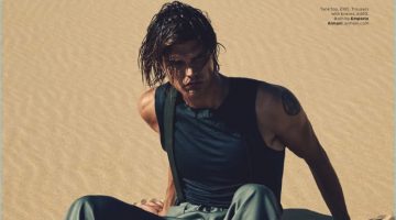 Lines in the Sand: Jesse Gwin & Brendon Beck for British GQ Nick Leary photographs Jesse Gwin in a tank, trousers, and suspenders by Emporio Armani.
