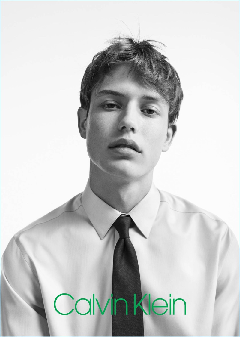 Sporting a simple shirt and tie, Nathan Morgan fronts Calvin Klein's spring-summer 2017 campaign.