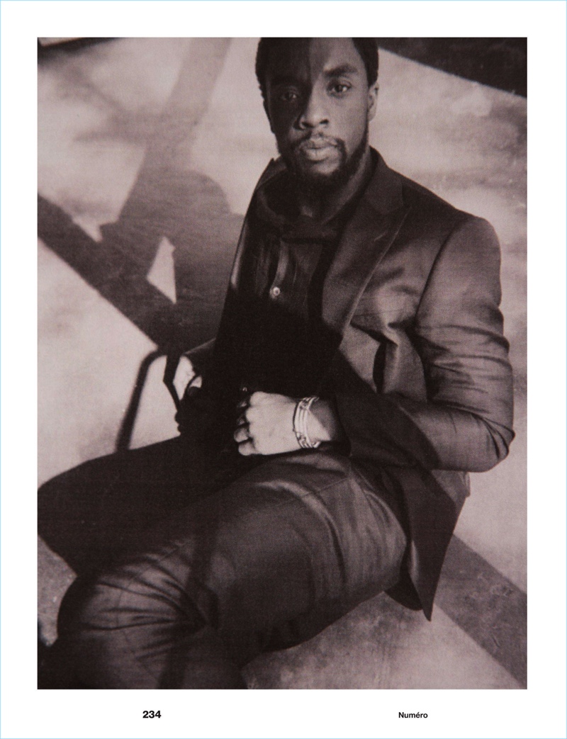 Actor Chadwick Boseman wears a Giorgio Armani suit.