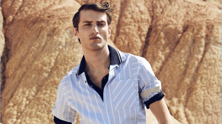Charlie France embraces a retro ease in a Lanvin shirt, polo, trousers, and belt.
