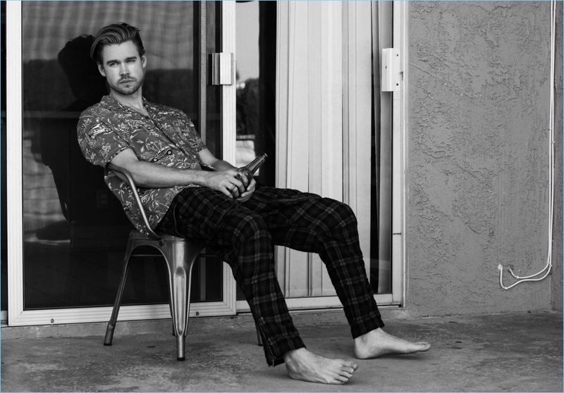 Chord Overstreet wears a Saint Laurent shirt with Faith Connexion pants.