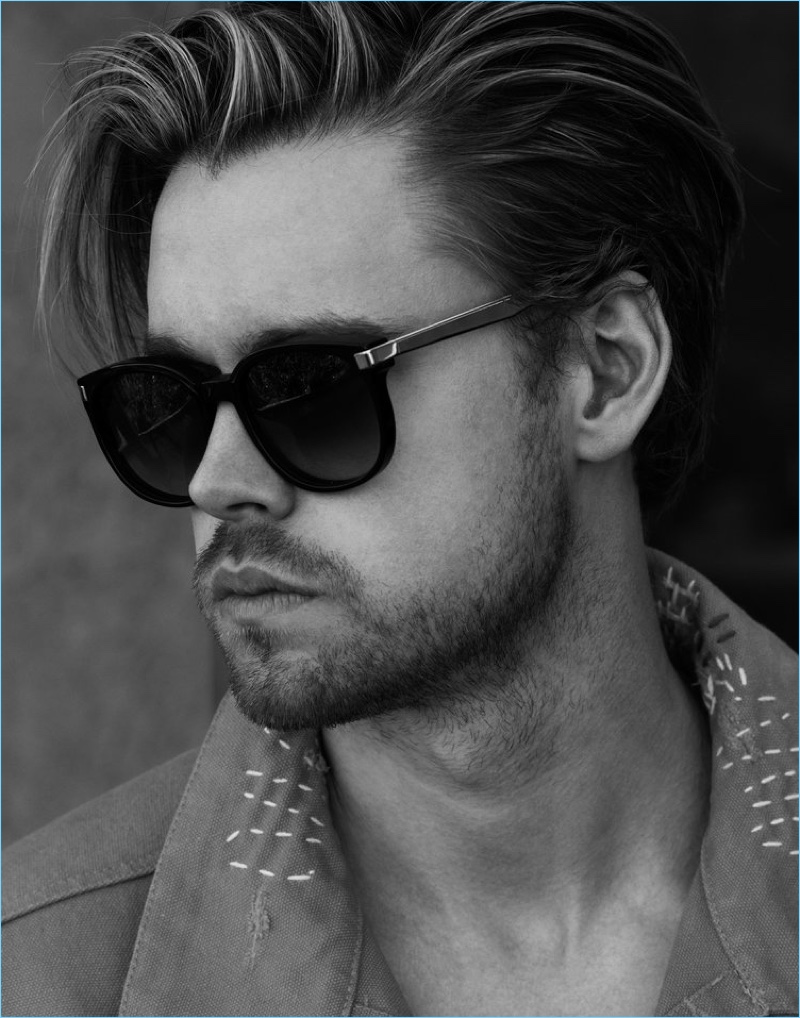 Ready for his close-up, Chord Overstreet rocks Wildfox sunglasses with a C2H4 jacket.