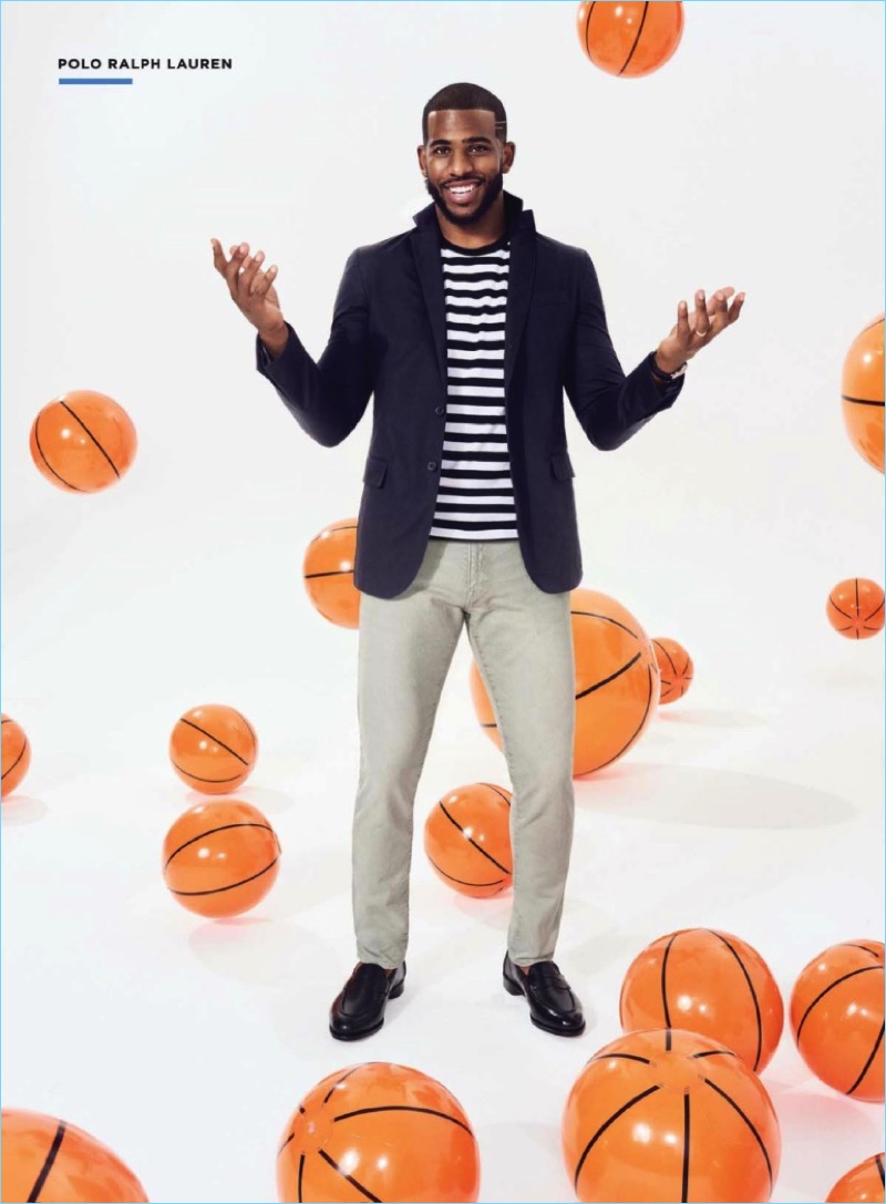 All smiles, Chris Paul rocks a POLO Ralph Lauren cotton-linen sport coat $495, striped pocket tee $59.50, and slim-fit jeans $125.