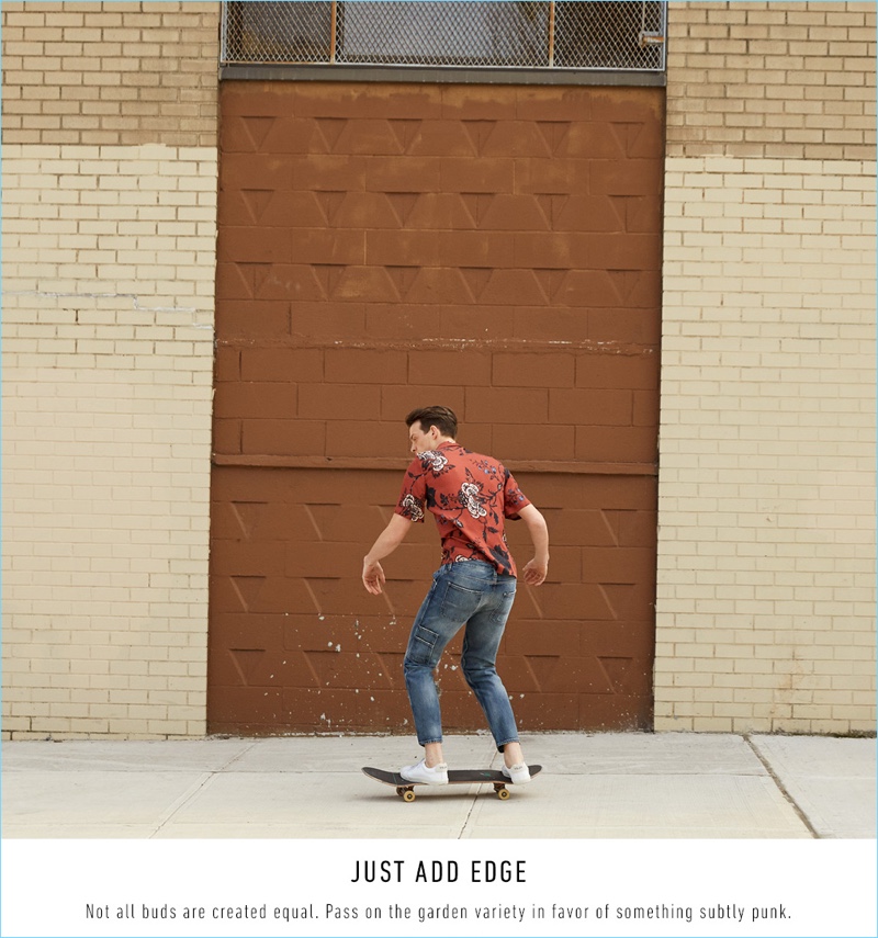 Skateboarding, Rocky Harwood wears a McQ by Alexander McQueen floral print shirt $237, Current/Elliott carpenter jeans $268, and Veja velcro leather sneakers $130.