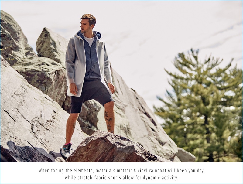 Going hiking, Rafael Lazzini wears a Stutterheim Stockholm frost raincoat $585, ISAORA running windbreaker $265, and Theory tee $105. He also sports DEN IM by Siki Im cargo drop jog shorts $225 and Adidas by Kolor sneakers $220.