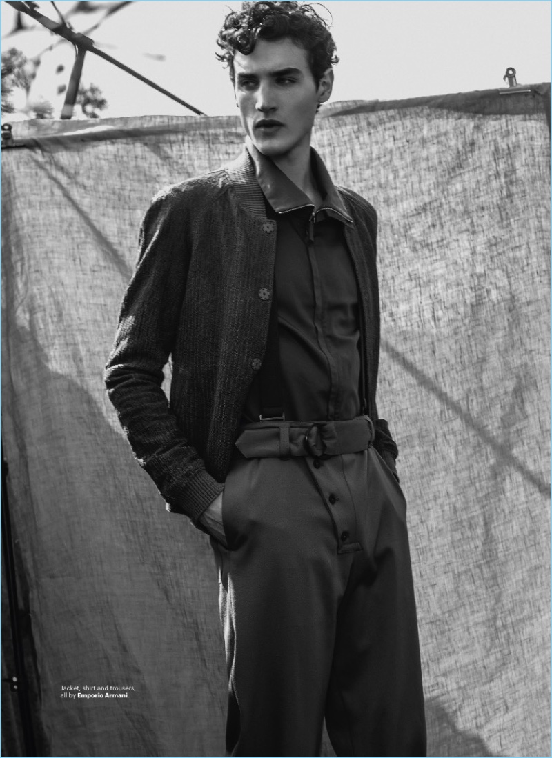 Embracing a military-inspired number, Federico Novello wears a shirt, jacket, and trousers from Emporio Armani.