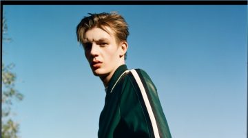 Finnlay Davis Steps Out in Current Looks for DSection Finnlay Davis wears a green leather track suit by Bally.