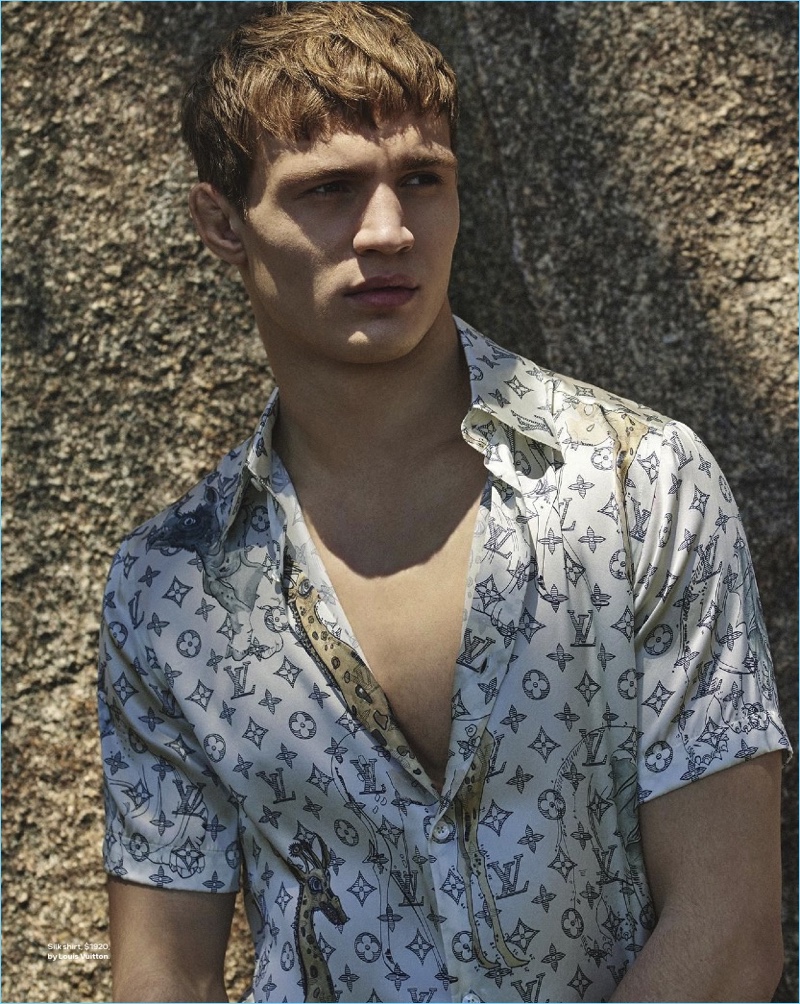 Model Julian Schneyder sports a monogram print Louis Vuitton shirt.