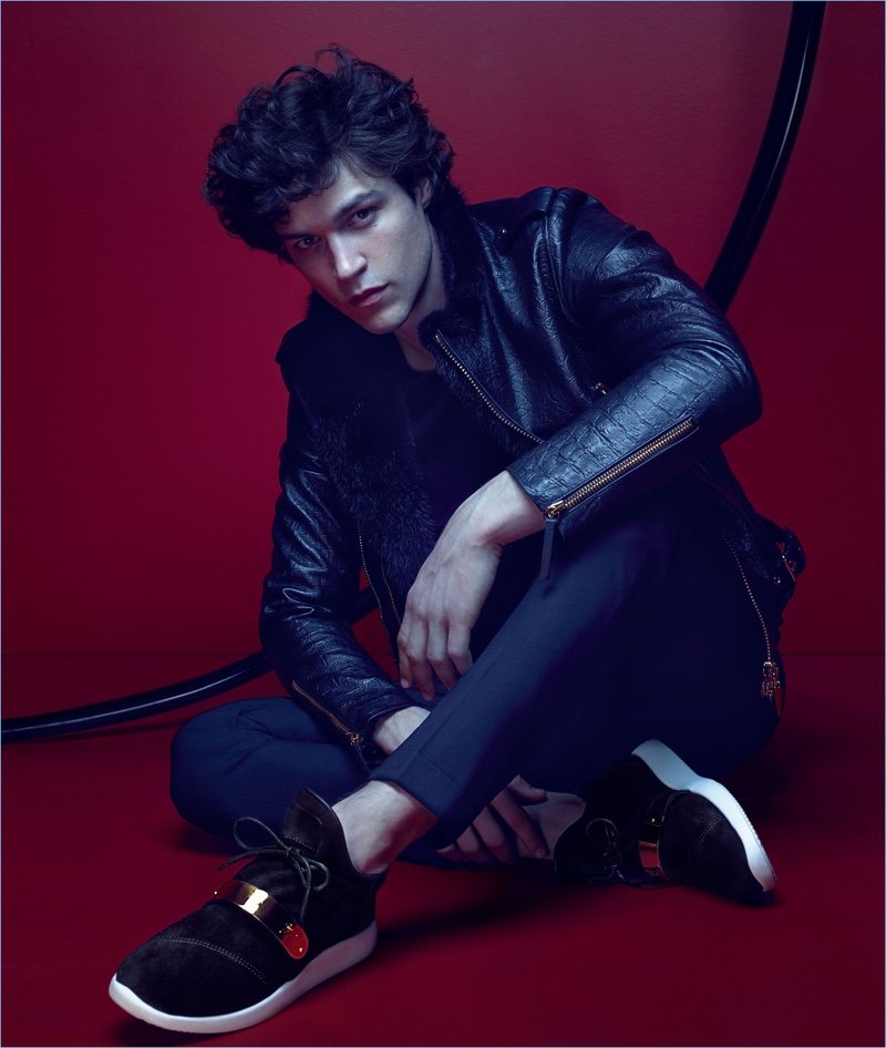 Front and center, Miles McMillan wears Giuseppe Zanotti Hayden suede sneakers for the label's fall-winter 2017 campaign.