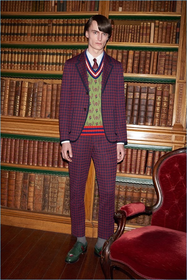 Make a statement in a Gucci burgundy houndstooth suit jacket $1,980 and trousers $680. Gucci brings more prints to the style agenda with its sweater vest $720, heart embroidered shirt $640, appliquéd leather wingtip brogues $1,250, and a tie $200.