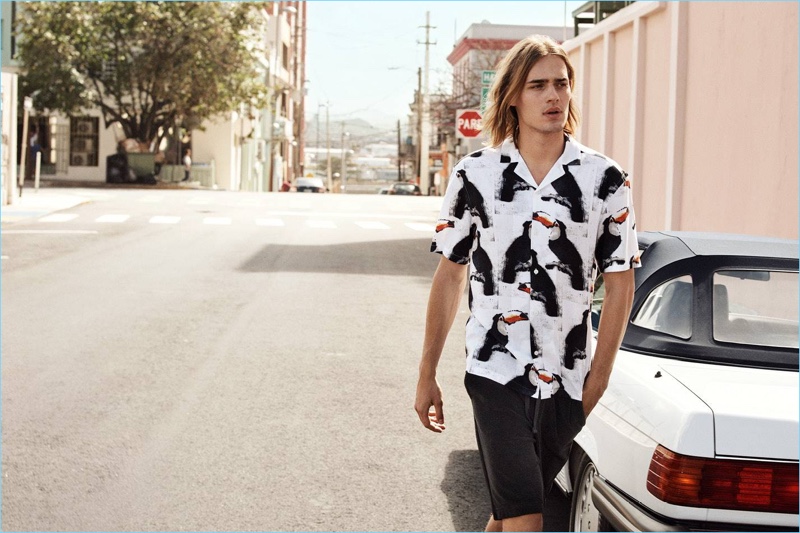 Ton Heukels sports a H&M Cuban collared resort shirt $24.99 and knee-length sweat shorts $24.99.