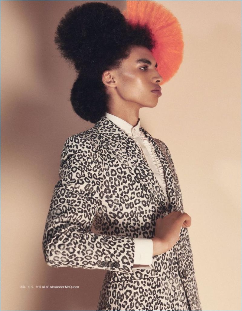 Sol Goss sports a leopard print look from Alexander McQueen.