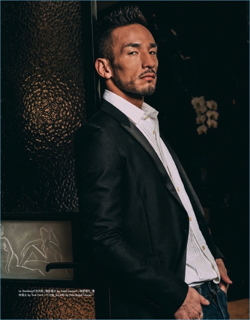 Footballer turned style icon, Hidetoshi Nakata wears a Saint Laurent smoking jacket with a Tom Ford shirt and POLO Ralph Lauren jeans.